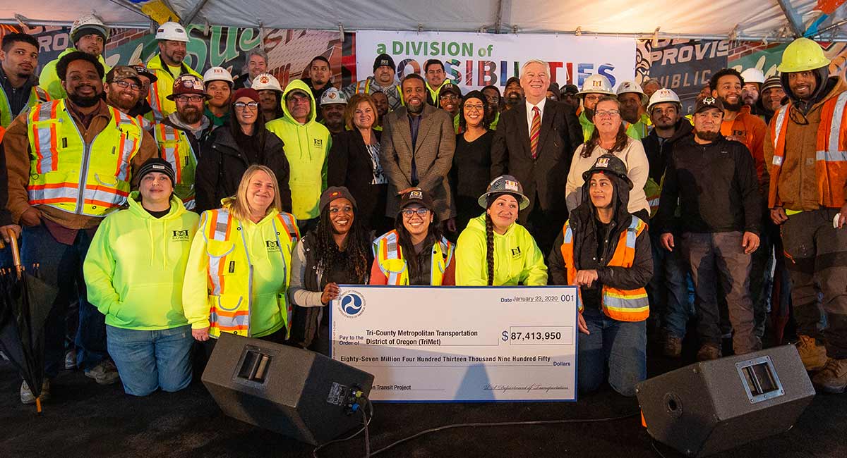 photo of construction workers at the Division Transit Project groundbreaking